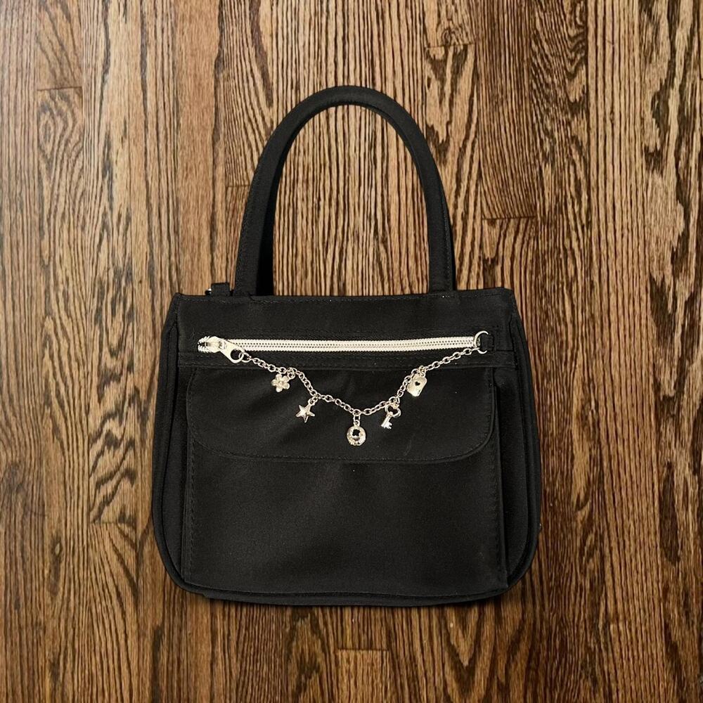 Black shoulder bag with silver charms